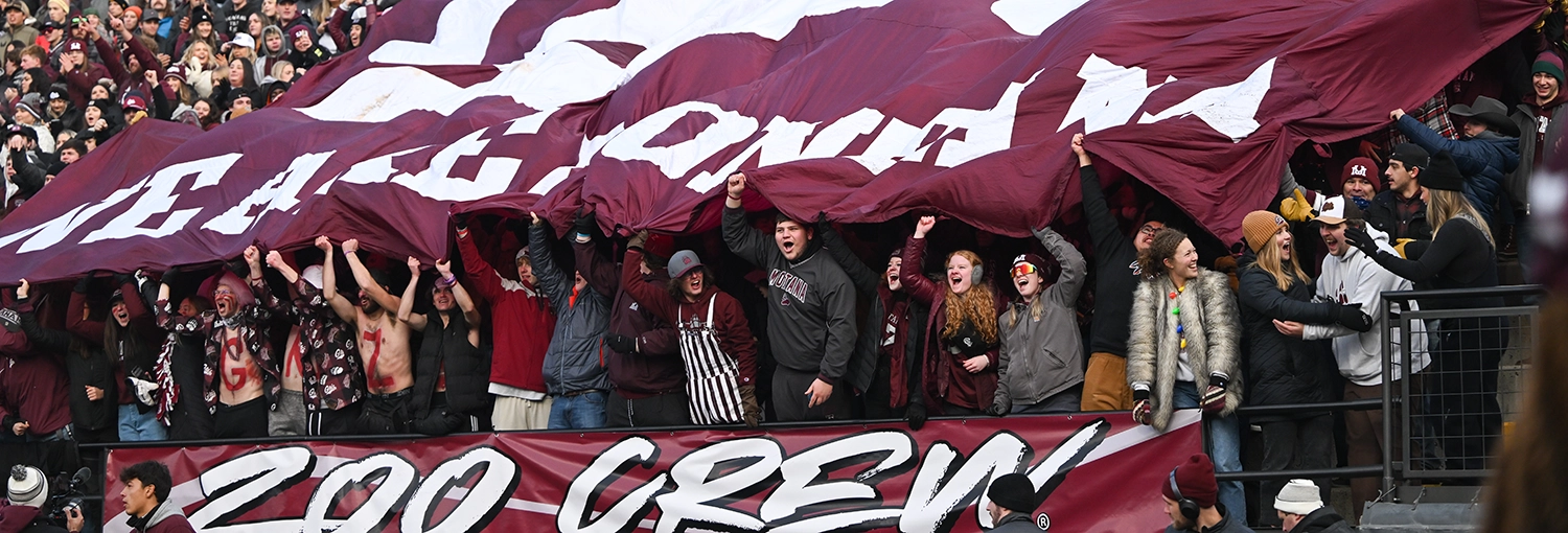 Griz fans in the student section cheer enthusiastically